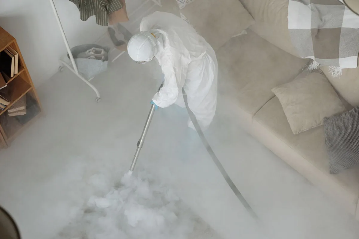 Biohazard cleanup technician in protective equipment, Cedar Crest, MA